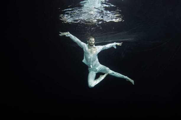 istock young male ballet dancer unerwater 649552228