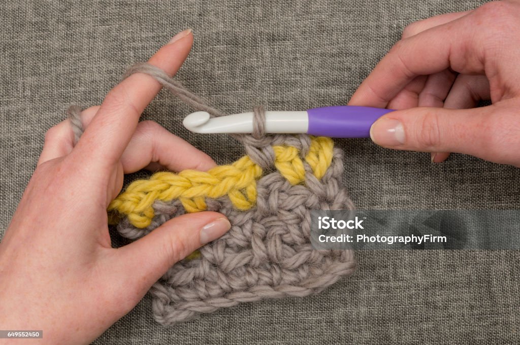 Hands Knitting Thick Wool With Large Crochet Hook Stock Photo - Download  Image Now - Circle, Close-up, Craft - iStock