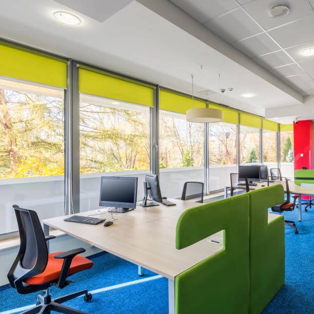 istock Colorful corporate interior with desks 649556742