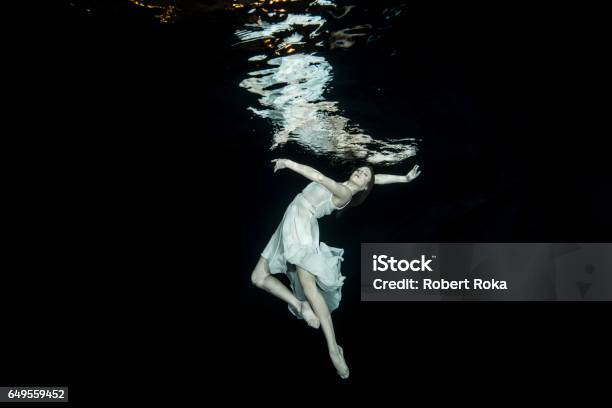 Young Female Ballet Dancer Dancing Underwater Stock Photo - Download Image Now - Underwater, Ballet Dancer, Ballet