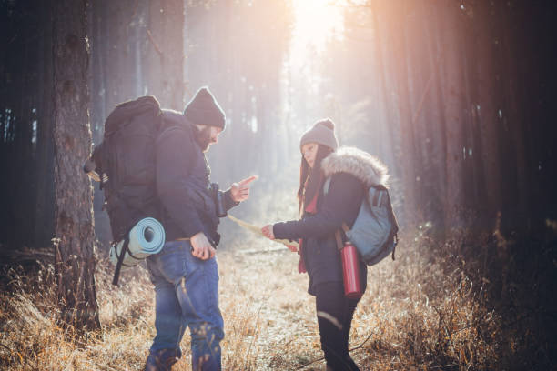 istock Couple of hikers in forest 649563552