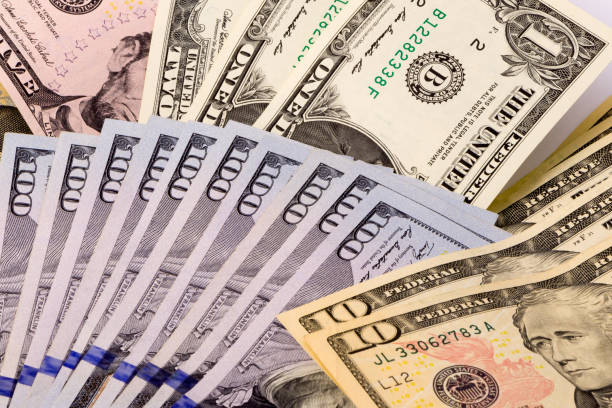 istock One, ten, and hundred dollars 649566850