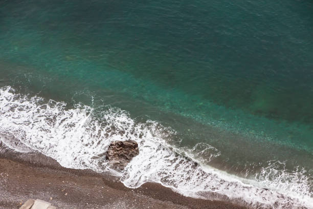 The Mediterranean sea and pebbles stones on a beach in Nice, France