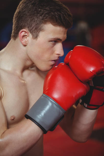 istock Close-up of confident boxer fighting 649570456