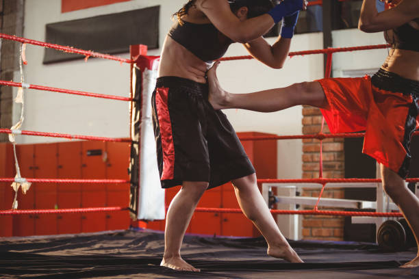 istock Two female boxers fighting in the ring 649570470