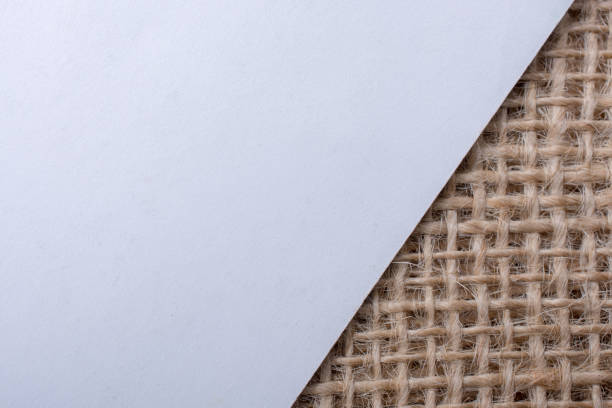 istock Piece of white paper  on a linen canvas 649579608