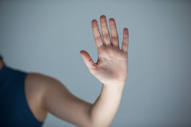 istock Hand of a woman touching an invisible screen 649580212