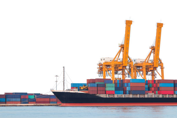 istock Cargo ship in the harbor isolated with clipping path 649580860
