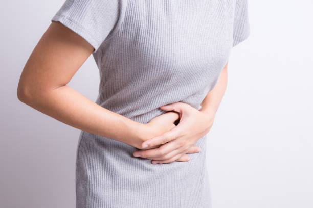 istock asian woman having stomachache 649591288