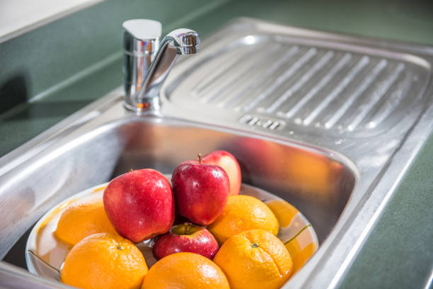 istock Washing fruits 649597220