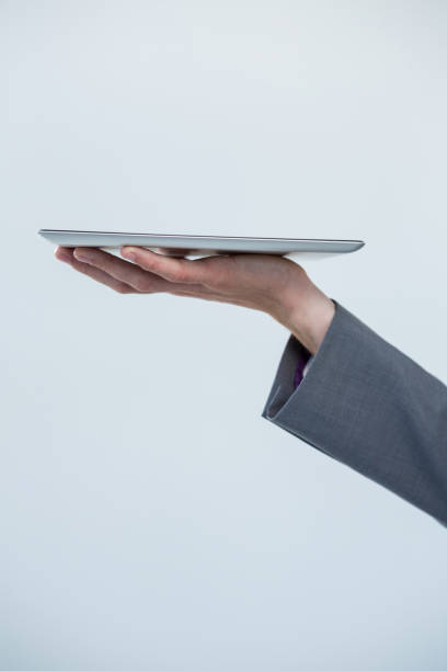 istock Businessman holding digital tablet 649597332