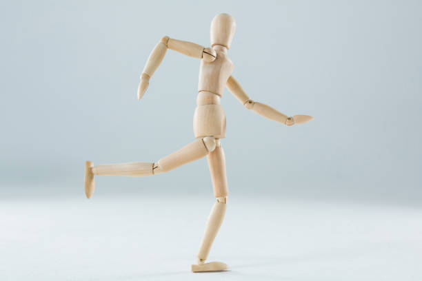 istock Wooden figurine running 649601358