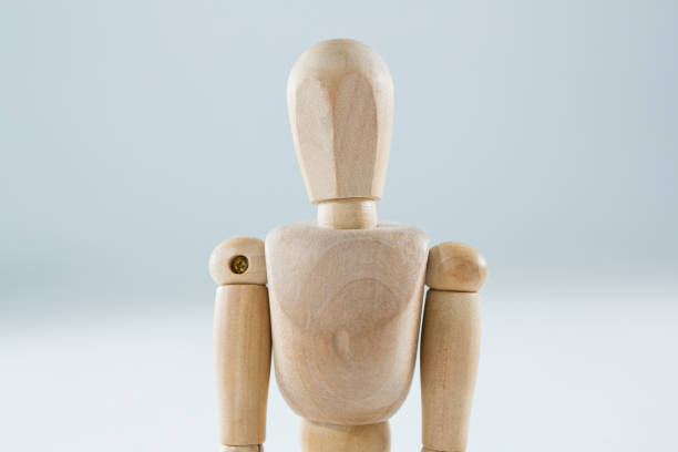 istock Wooden figurine standing 649601364
