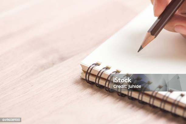 Hands Writing On Notebook Stock Photo - Download Image Now - Note Pad, Letter - Document, Pencil