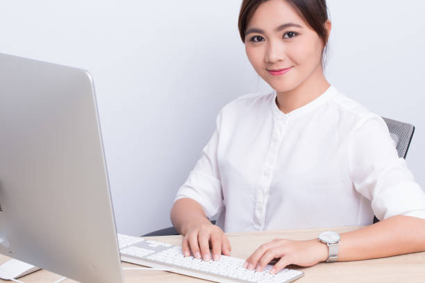 istock Asian woman show her smile at office 649612126