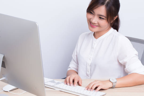 istock Asian woman show her smile at office 649612172