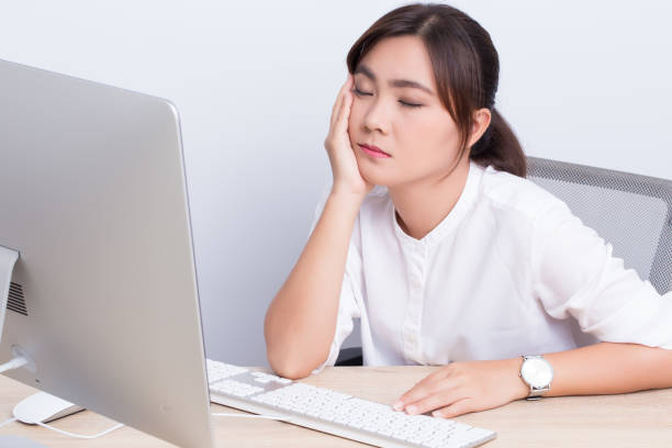 istock Woman take a nap at office 649612988