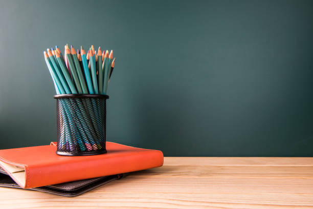 istock Concept of education or back to school on green background 649613042