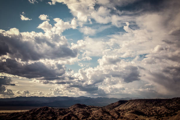 istock High Desert Sunset with Blue Sky and Fluffy Clouds 649616138