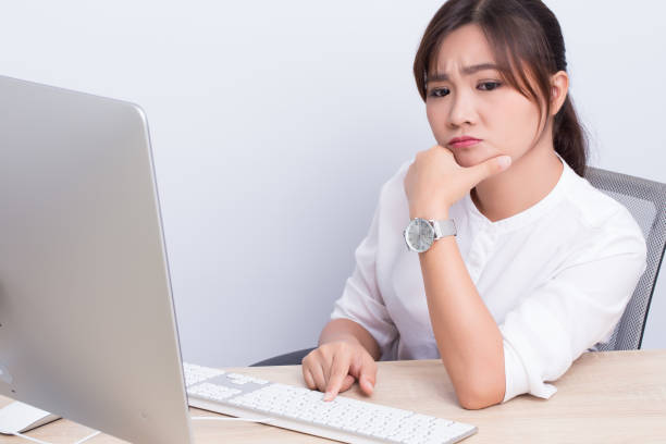istock Woman use the computer and she feel boring 649618336