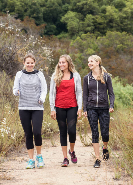 Three Women Walking and working out Together