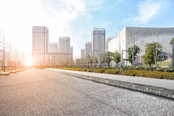 istock empty pavement and modern buildings in city 649625580