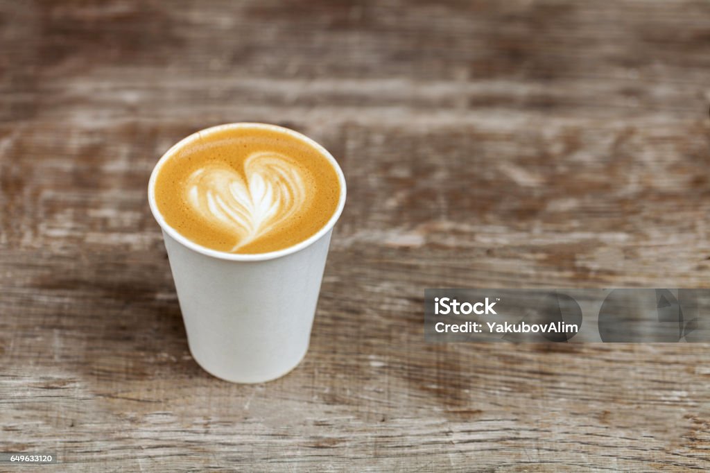 Cappuccino in a paper cup to go Coffee - Drink Stock Photo
