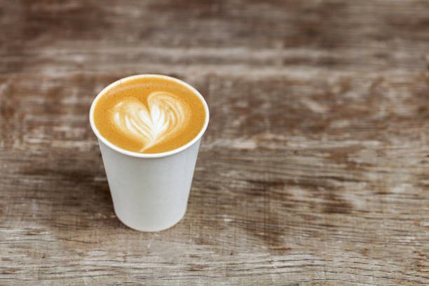 cappuccino in a paper cup to go - starbucks take out food coffee disposable cup imagens e fotografias de stock