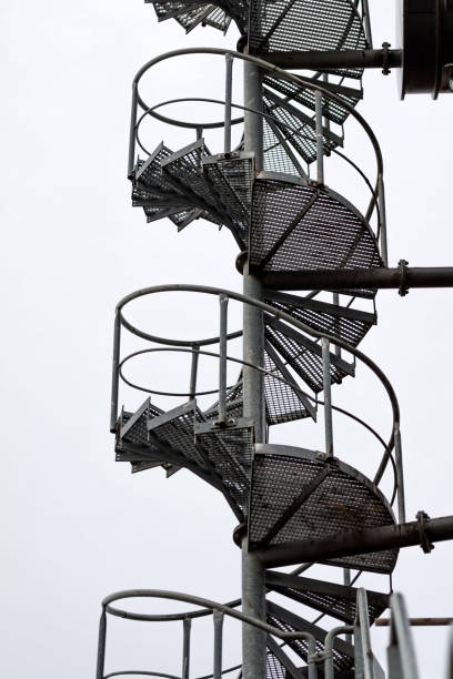 istock Spiral metal stairs. 649634114