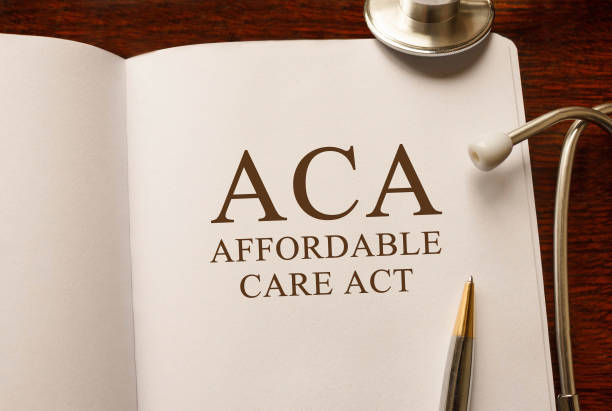 istock Page with ACA Affordable Care Act on the table with stethoscope, medical concept 649635012