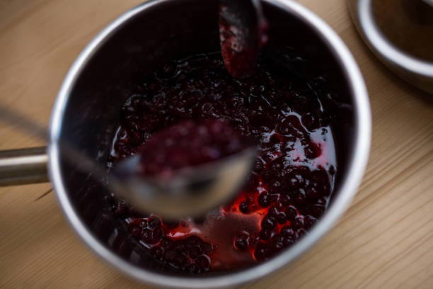 istock Close-up of jam in a pan on table 649635084