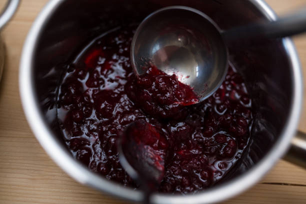 istock Close-up of jam in a pan on table 649635268