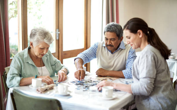 istock Doing puzzles as a team can help revive social skills 649643514