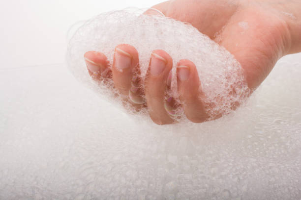 istock Child washing hands  in foam 649646158