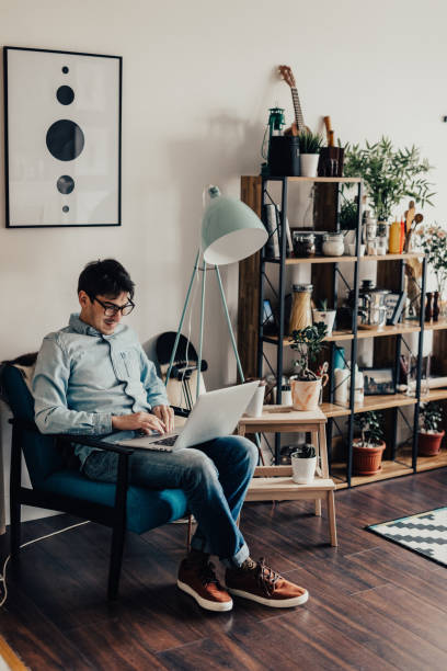 istock Man is most inspired when carefree sitting at home and doing nothing 649646928