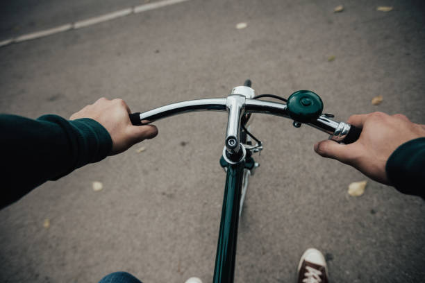 istock Hands on the handlebars of a bike 649653570