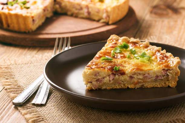 istock Traditional french pie with bacon and cheese - quiche lorraine. 649653816