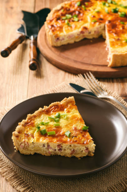 istock Traditional french pie with bacon and cheese - quiche lorraine. 649653832