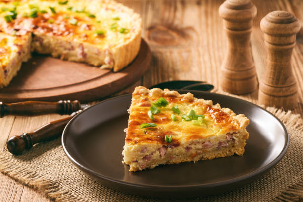 istock Traditional french pie with bacon and cheese - quiche lorraine. 649653864