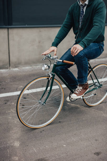 istock Unrecognizable persone riding a bike 649658354