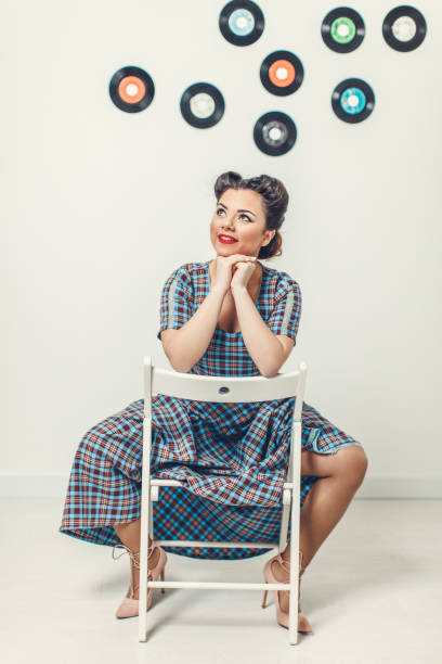 istock Beautiful young woman pin up style 649664880