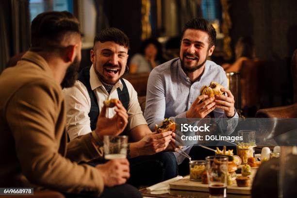 Pub Food And Drinks Stock Photo - Download Image Now - Friendship, Restaurant, Bar - Drink Establishment