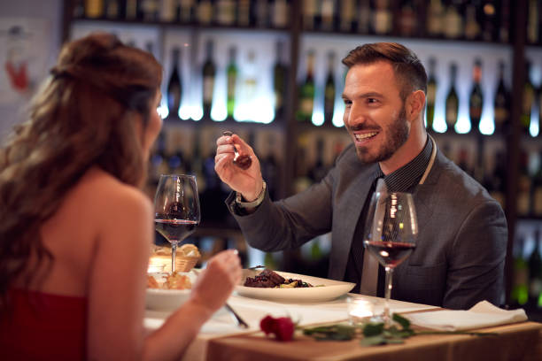 istock Couple enjoying together in restaurant 649672242