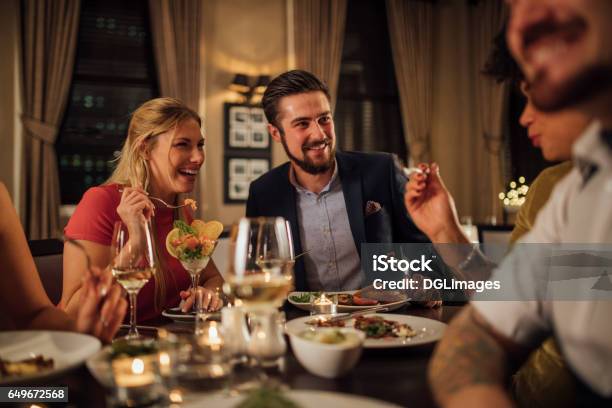 Couple At A Restaurant Meal Stock Photo - Download Image Now - Restaurant, Gourmet, Luxury