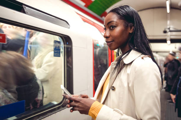 istock Woman taking the subway train 649672884