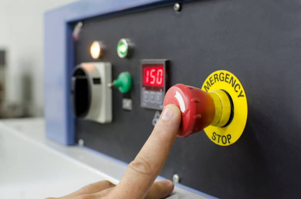 istock industrial details - hand pressing important technology button at control panel in plant 649675544