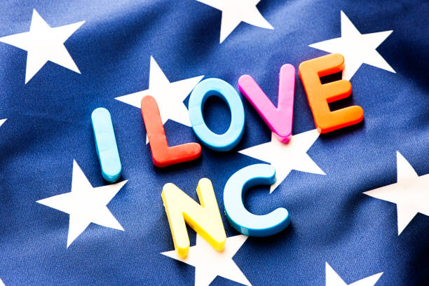 istock American flag with I Love NC  word 649676606