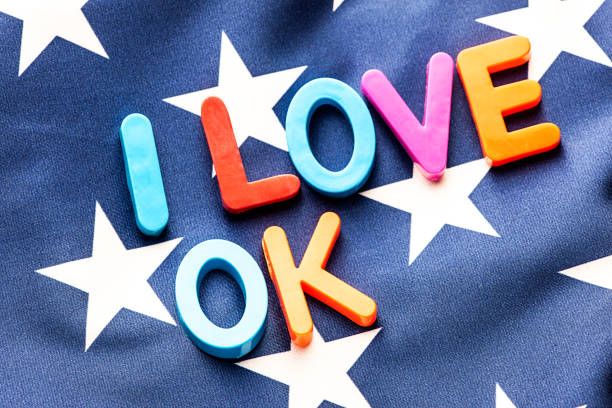 istock American flag with I Love OK word 649677244