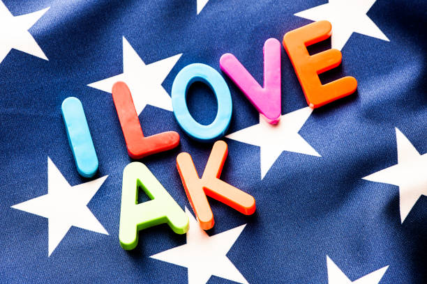 istock American flag with I Love AK word 649677280
