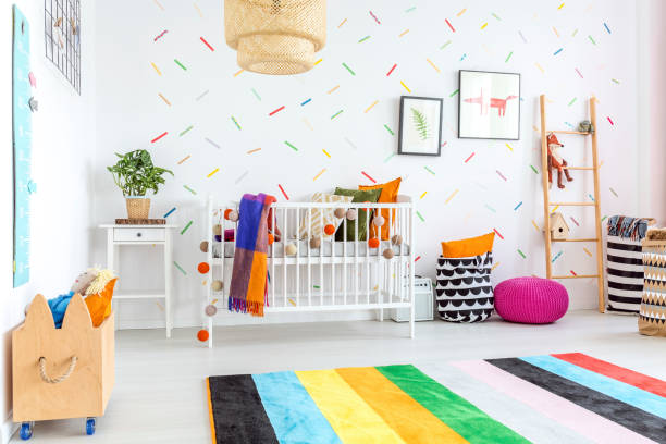 istock Colorful carpet in baby room 649679644